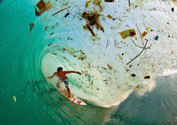 Java-Indonesia-sea-wave-polluted-trash-surf